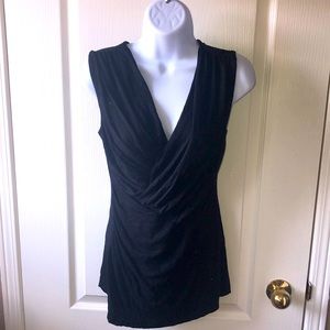 Flattering long black top. Size medium